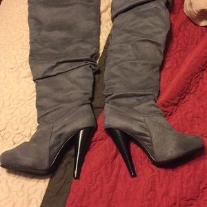 Over the knee suede boots. From Vegas.